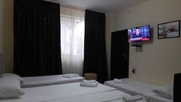 Фото номера Четырехместный номер с террасой Гостевой дом Guest Rooms Simona г. Opanets 6
